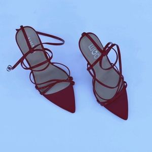 Strappy, pointed toe heels